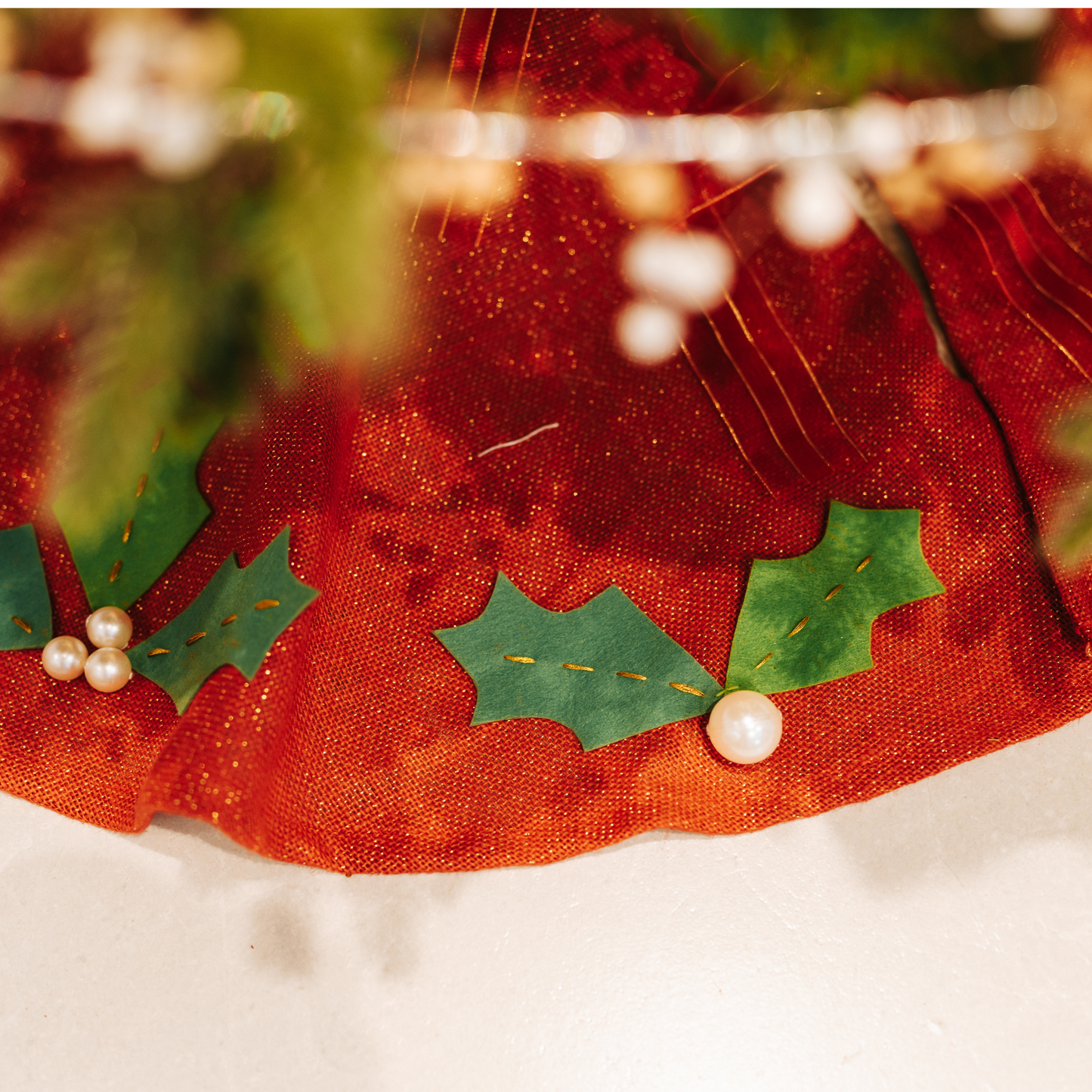 Red Tree Skirt with holly leaves & Pearls