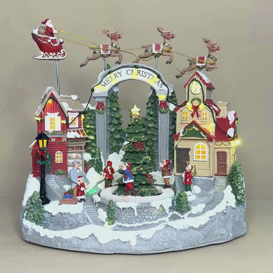 Load and play video in Gallery viewer, Christmas Village with Moving Santa sleigh, Music and LED lights
